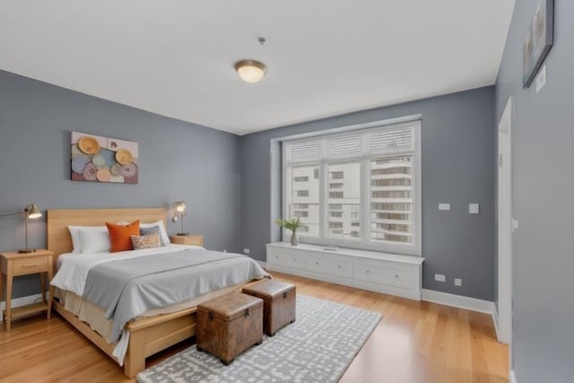 bedroom featuring light hardwood / wood-style floors