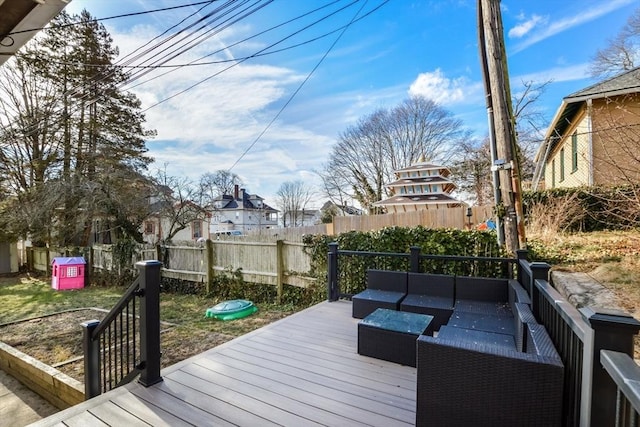 wooden deck featuring an outdoor living space