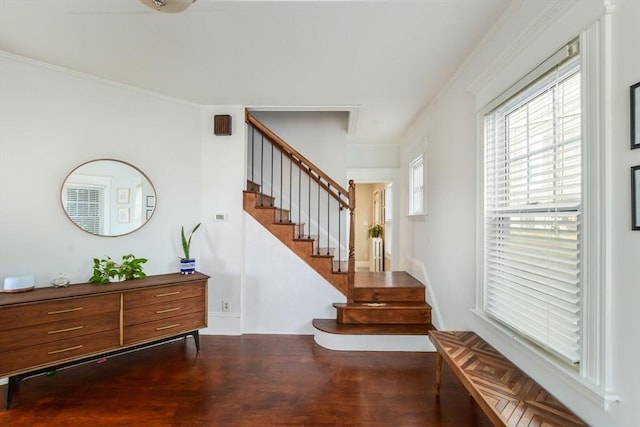 stairway with crown molding