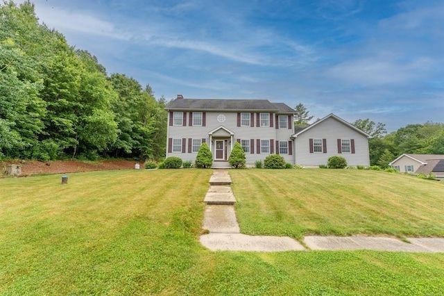 39 Grey Fox Lndg, Woodstock, CT 06281 - colonial home featuring a front yard and a chimney