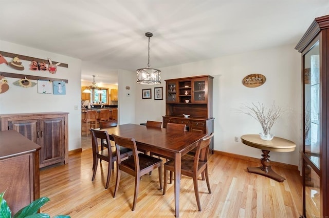39 Grey Fox Lndg, Woodstock, CT 06281 - dining area featuring a chandelier and light wood-style flooring