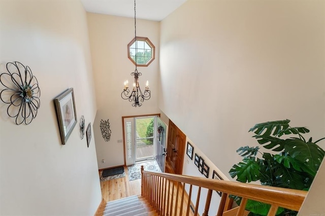 39 Grey Fox Lndg, Woodstock, CT 06281 - foyer entrance with a towering ceiling, a chandelier, and wood finished floors