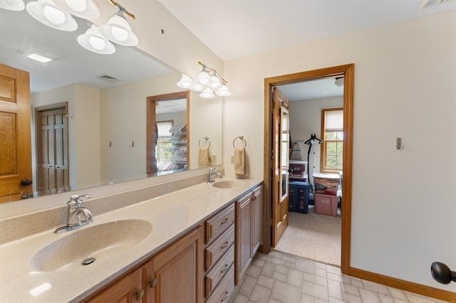 39 Grey Fox Lndg, Woodstock, CT 06281 - bathroom featuring double vanity and baseboards