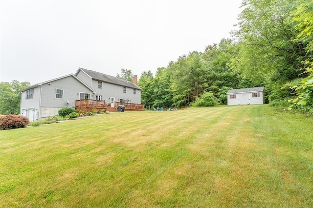 39 Grey Fox Lndg, Woodstock, CT 06281 - view of grassy yard featuring a deck, a shed, and an attached garage