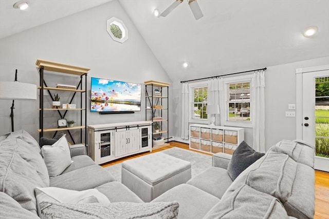 45 S Elm St, West Bridgewater, MA 02379 - living area with wood finished floors, recessed lighting, healthy amount of natural light, ceiling fan, and a baseboard heating unit
