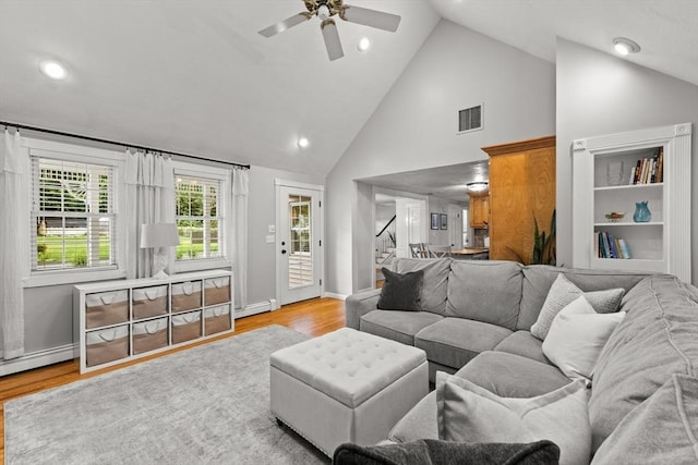 45 S Elm St, West Bridgewater, MA 02379 - living area with high vaulted ceiling, light wood-style flooring, stairway, a ceiling fan, and recessed lighting