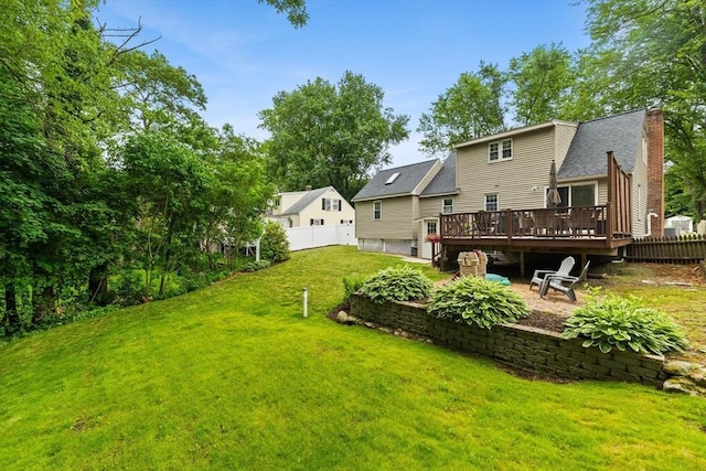 45 S Elm St, West Bridgewater, MA 02379 - rear view of house with a wooden deck, a chimney, and a patio