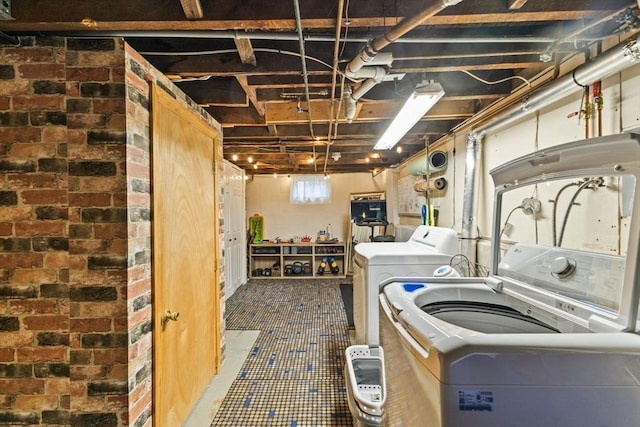 45 S Elm St, West Bridgewater, MA 02379 - washroom featuring separate washer and dryer and brick wall