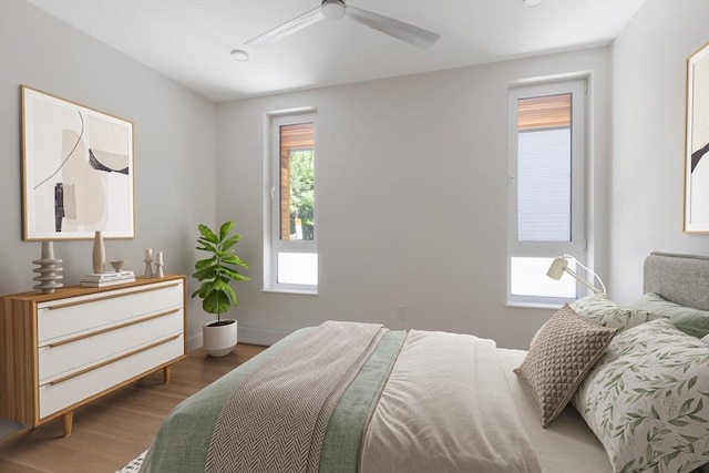 213 Harvard Unit 4, Cambridge, MA 02139 - bedroom featuring wood finished floors and ceiling fan