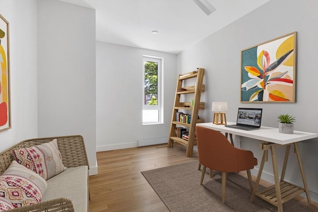 213 Harvard Unit 4, Cambridge, MA 02139 - office area featuring wood finished floors and baseboards