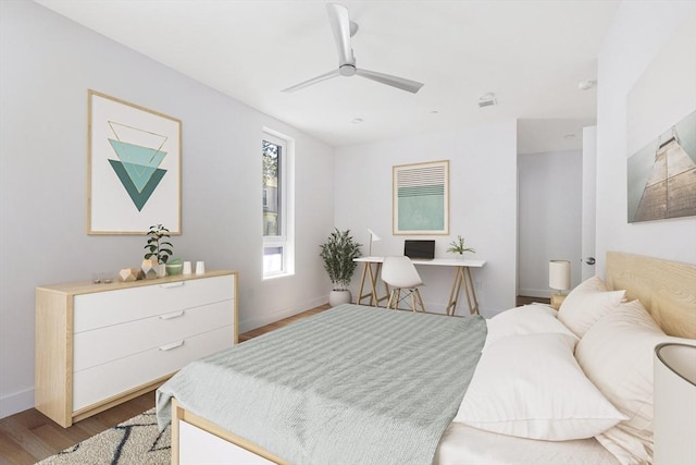 213 Harvard Unit 4, Cambridge, MA 02139 - bedroom with wood finished floors and ceiling fan