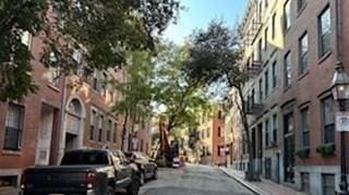 view of road featuring sidewalks and a residential view