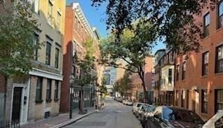 view of street featuring a residential view and sidewalks