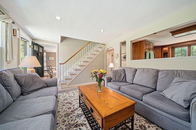 771 Ferry St, Marshfield, MA 02050 - living area with stairs, recessed lighting, arched walkways, and baseboards