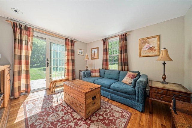 771 Ferry St, Marshfield, MA 02050 - living area with healthy amount of natural light and light wood-style flooring