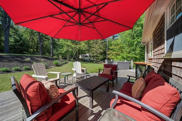 771 Ferry St, Marshfield, MA 02050 - deck with an outdoor living space, view of wooded area, and a lawn