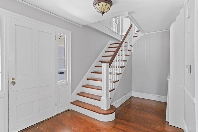 entryway with dark wood-type flooring