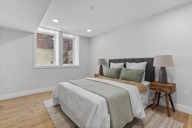 bedroom featuring light hardwood / wood-style floors