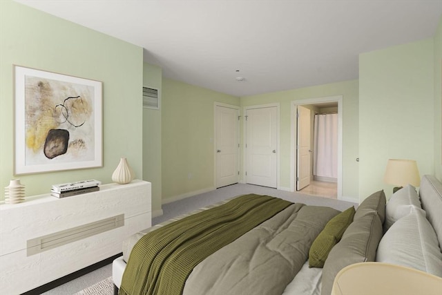 carpeted bedroom with baseboards