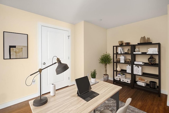 office with baseboards and wood finished floors