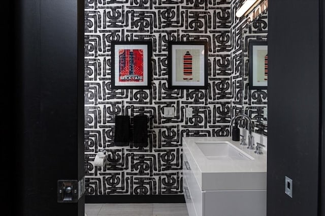 bathroom with vanity and tile patterned flooring