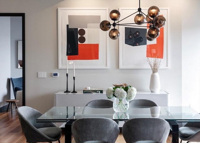 dining room with hardwood / wood-style flooring