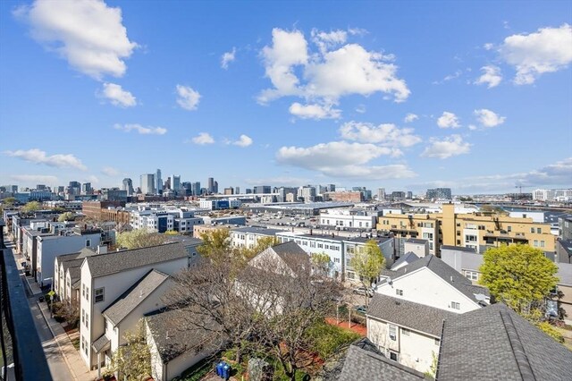 birds eye view of property featuring a view of city