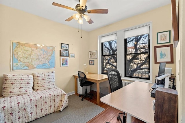 office area featuring hardwood / wood-style floors and ceiling fan