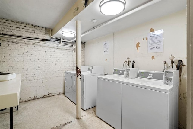 laundry room with washer and clothes dryer