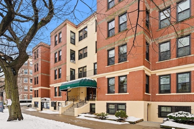 view of snow covered property