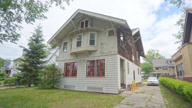 31 Burton St, Springfield, MA 01108 - back of house featuring a lawn
