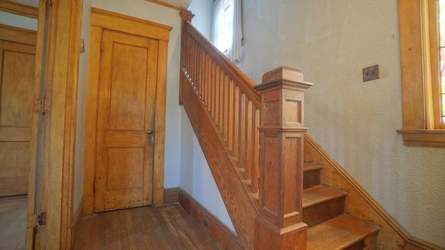 31 Burton St, Springfield, MA 01108 - stairway with wood finished floors and baseboards