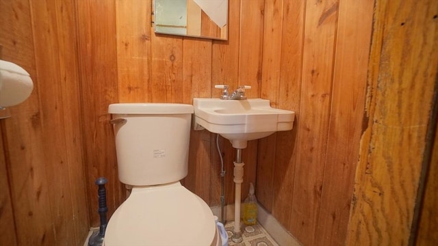 31 Burton St, Springfield, MA 01108 - bathroom featuring wooden walls and toilet
