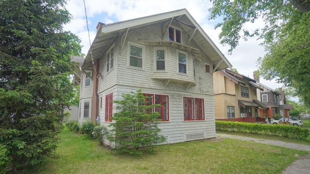 31 Burton St, Springfield, MA 01108 - view of side of property featuring a lawn