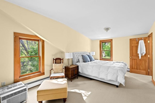 67 Greenfield Ln, Scituate, MA 02066 - bedroom with a baseboard heating unit and light carpet