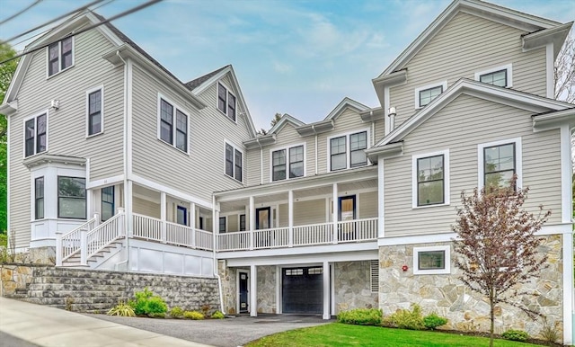 11 Conway St Unit 3, Boston, MA 02131 - view of property with an attached garage and driveway