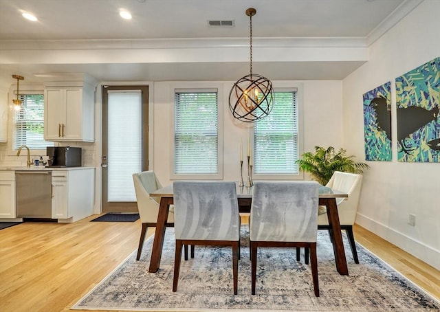 11 Conway St Unit 3, Boston, MA 02131 - dining space with ornamental molding, light wood-style flooring, baseboards, a chandelier, and recessed lighting