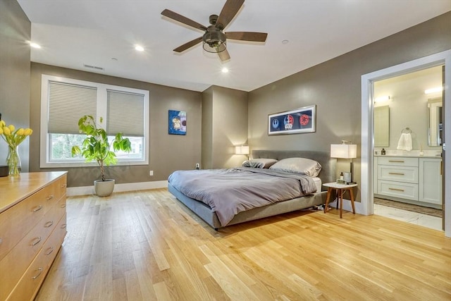 11 Conway St Unit 3, Boston, MA 02131 - bedroom with baseboards, light wood-style flooring, recessed lighting, and ensuite bath