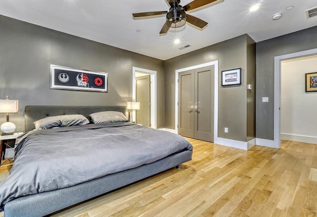 11 Conway St Unit 3, Boston, MA 02131 - bedroom with light wood-style floors, baseboards, a closet, a ceiling fan, and recessed lighting