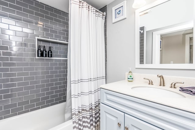 bathroom with vanity and shower / bath combination with curtain