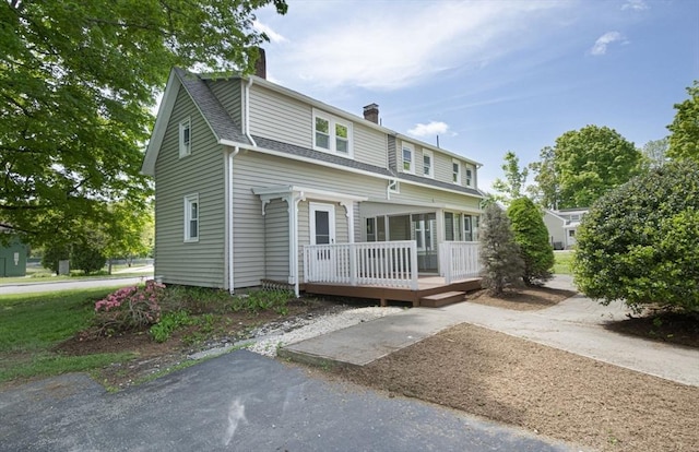 view of front of home with a wooden deck