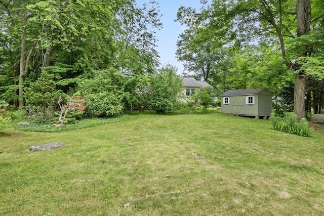 6 Cherry Ridge Rd, Acton, MA 01720 - view of green lawn with a shed