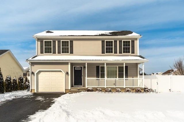 view of front facade featuring a porch and a garage