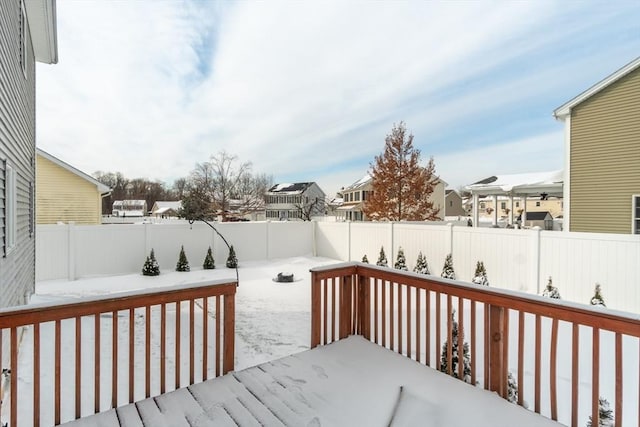 view of snow covered deck