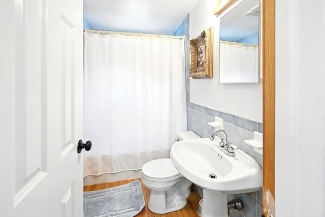 77 Marblehead St, North Reading, MA 01864 - full bath with tile walls, toilet, and a sink