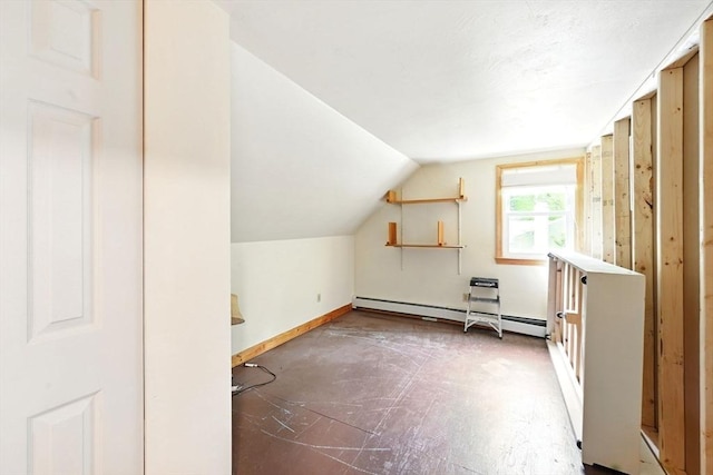 77 Marblehead St, North Reading, MA 01864 - additional living space featuring baseboard heating, lofted ceiling, and baseboards