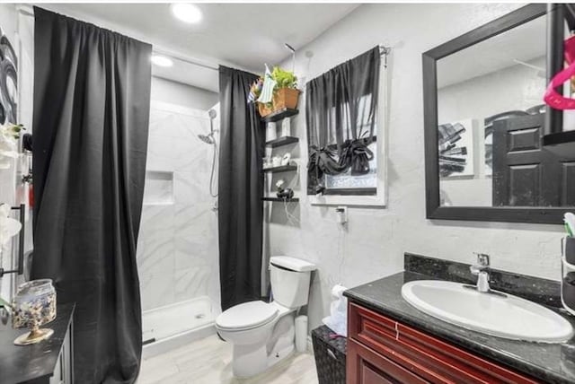 629 Cambridge St, Worcester, MA 01610 - full bath featuring vanity, toilet, a stall shower, and recessed lighting