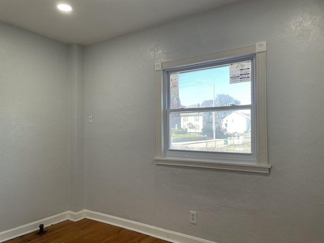 629 Cambridge St, Worcester, MA 01610 - empty room featuring dark wood finished floors, baseboards, and recessed lighting