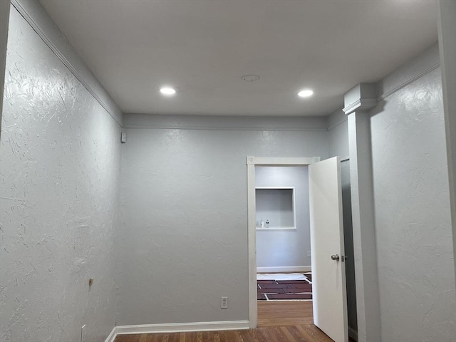 629 Cambridge St, Worcester, MA 01610 - spare room featuring dark wood-type flooring, recessed lighting, baseboards, and a textured wall