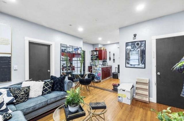 629 Cambridge St, Worcester, MA 01610 - living area with wood finished floors and recessed lighting